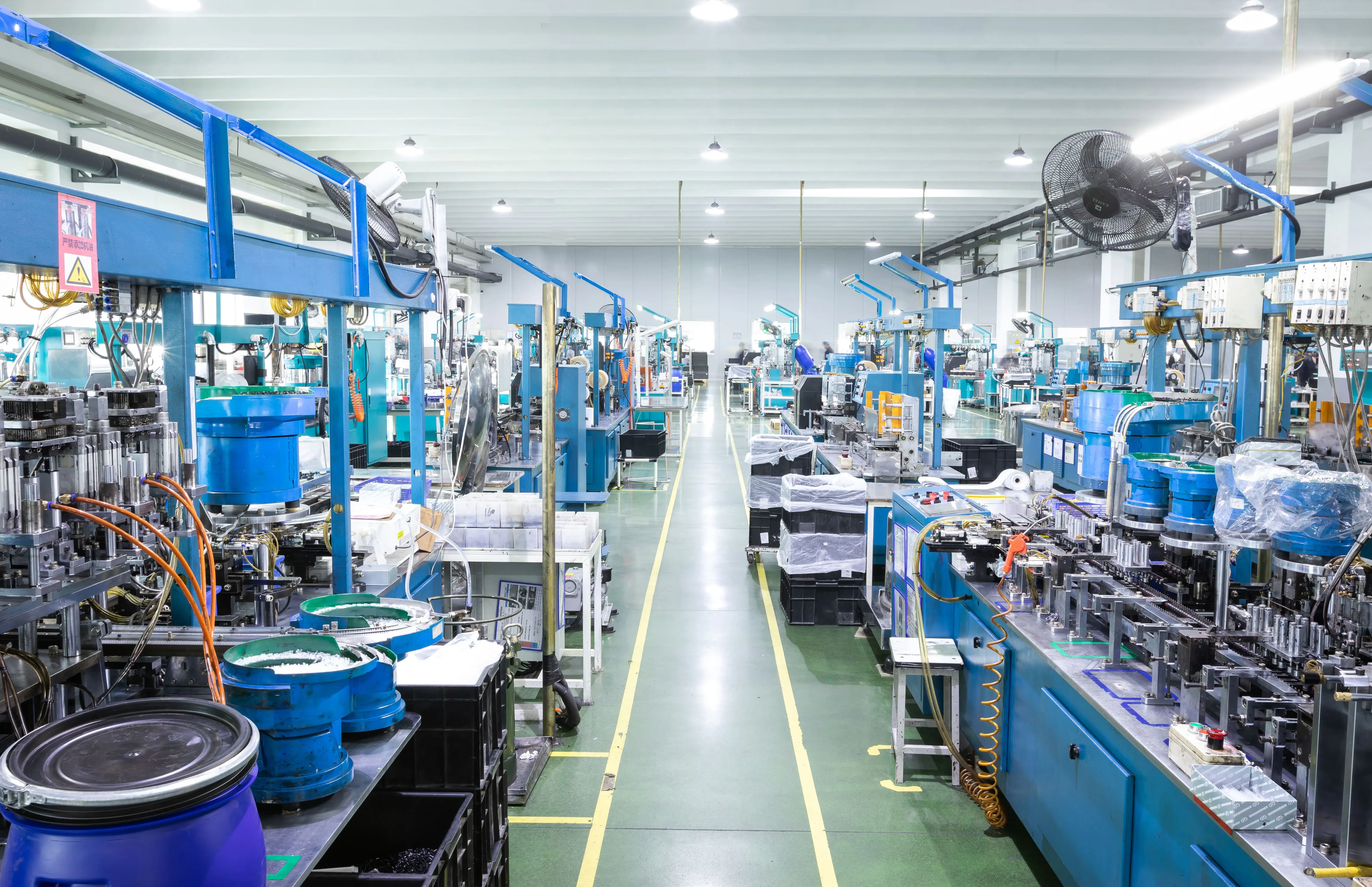 Factory workers assembling products on a production line